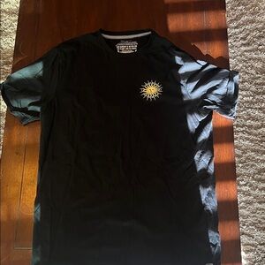 Black volcom T-Shirt with Yellow Sun Design